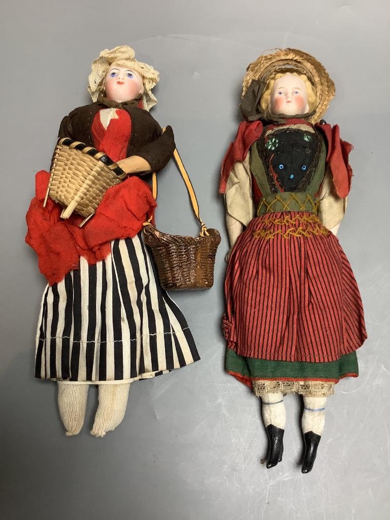 Two costume dolls, one an Oyster bisque head, height 28cm, two bisque shoulder plate/boots/hands, height 28cm